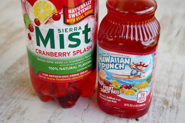 A bottle of cranberry Sierra mist and a bottle of Hawaiian Punch