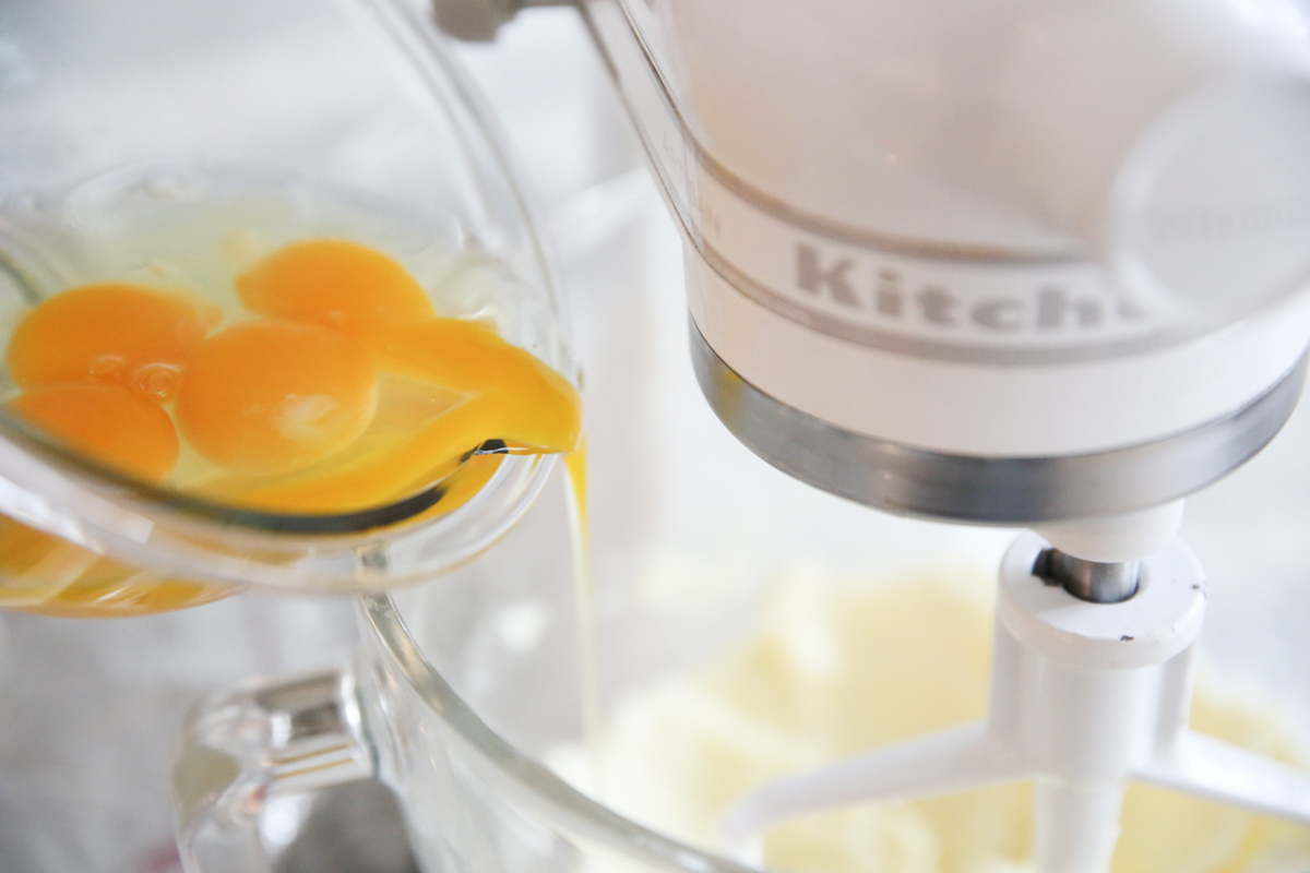 pouring egg yolks into bowl