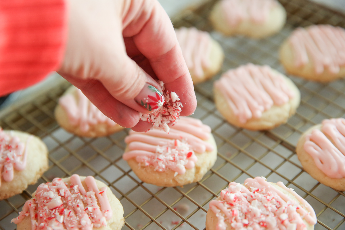 sprinkling candy canes on peppermint meltaways