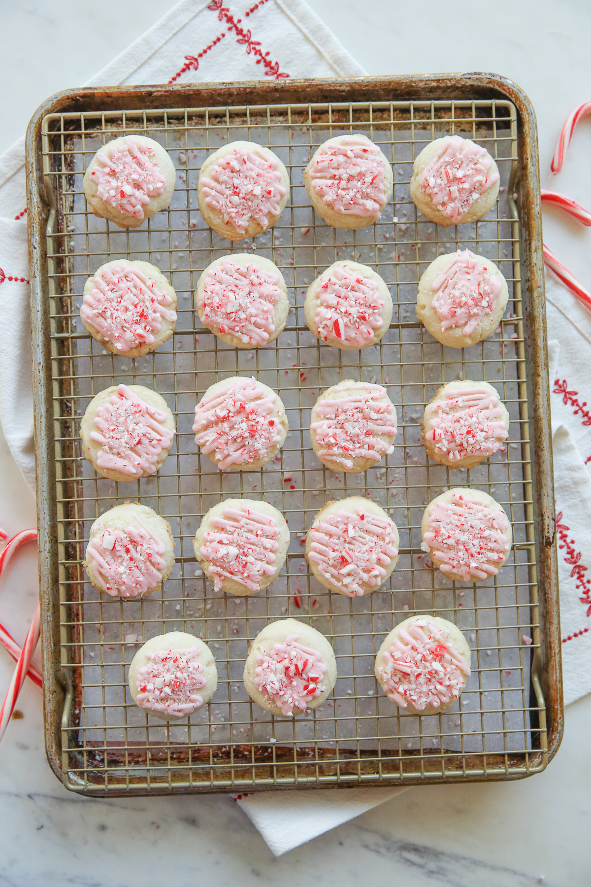 peppermint meltaway cookies on a baking rack