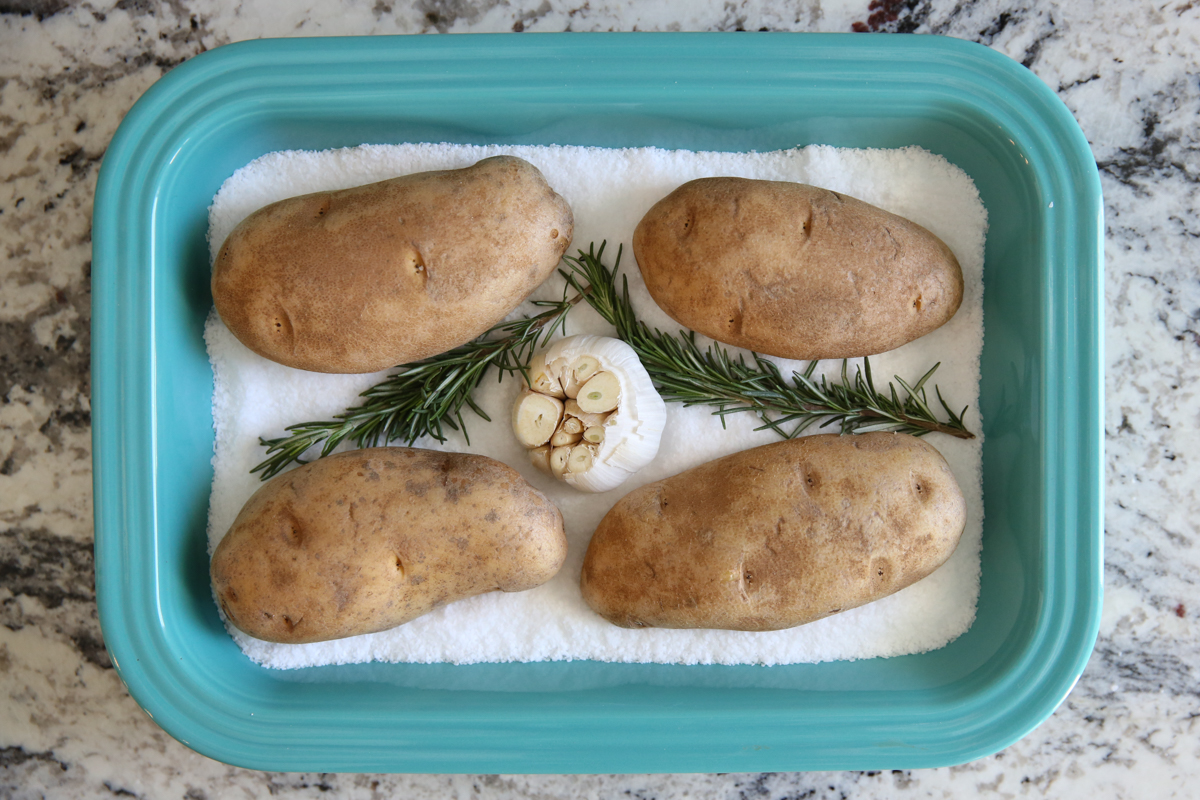 potatoes in a pan of salt