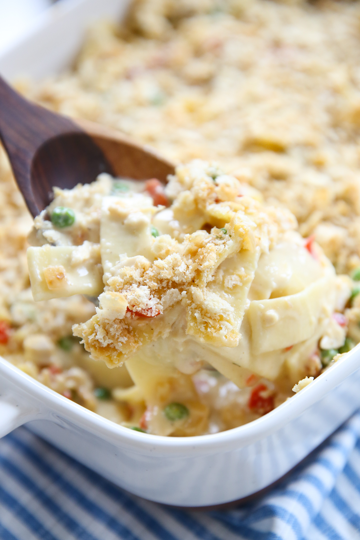 spoon of creamy chicken noodle casserole