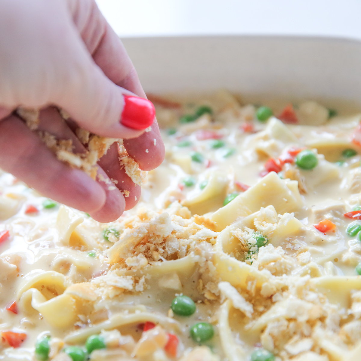 sprinkling cracker crumbs over casserole