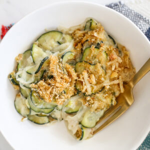 Zucchini gratin in a white bowl