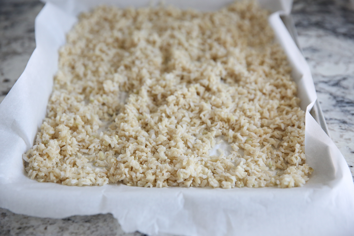 brown rice on baking sheet
