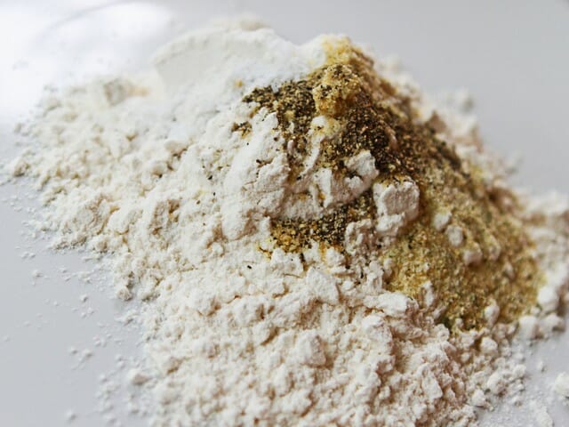 Baked pork chops in creamy Brie and mushroom sauce from Our Best Bites