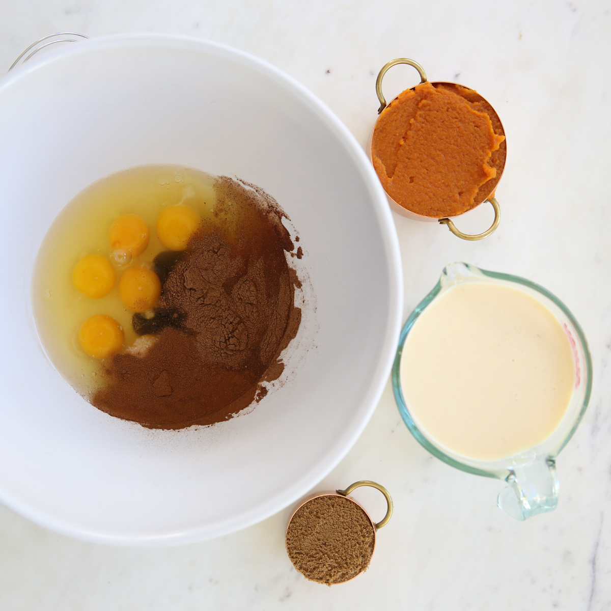 ingredients for pumpkin custard on a table
