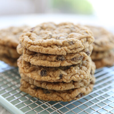 stack of oatmeal raisin cookies on a cooling rack