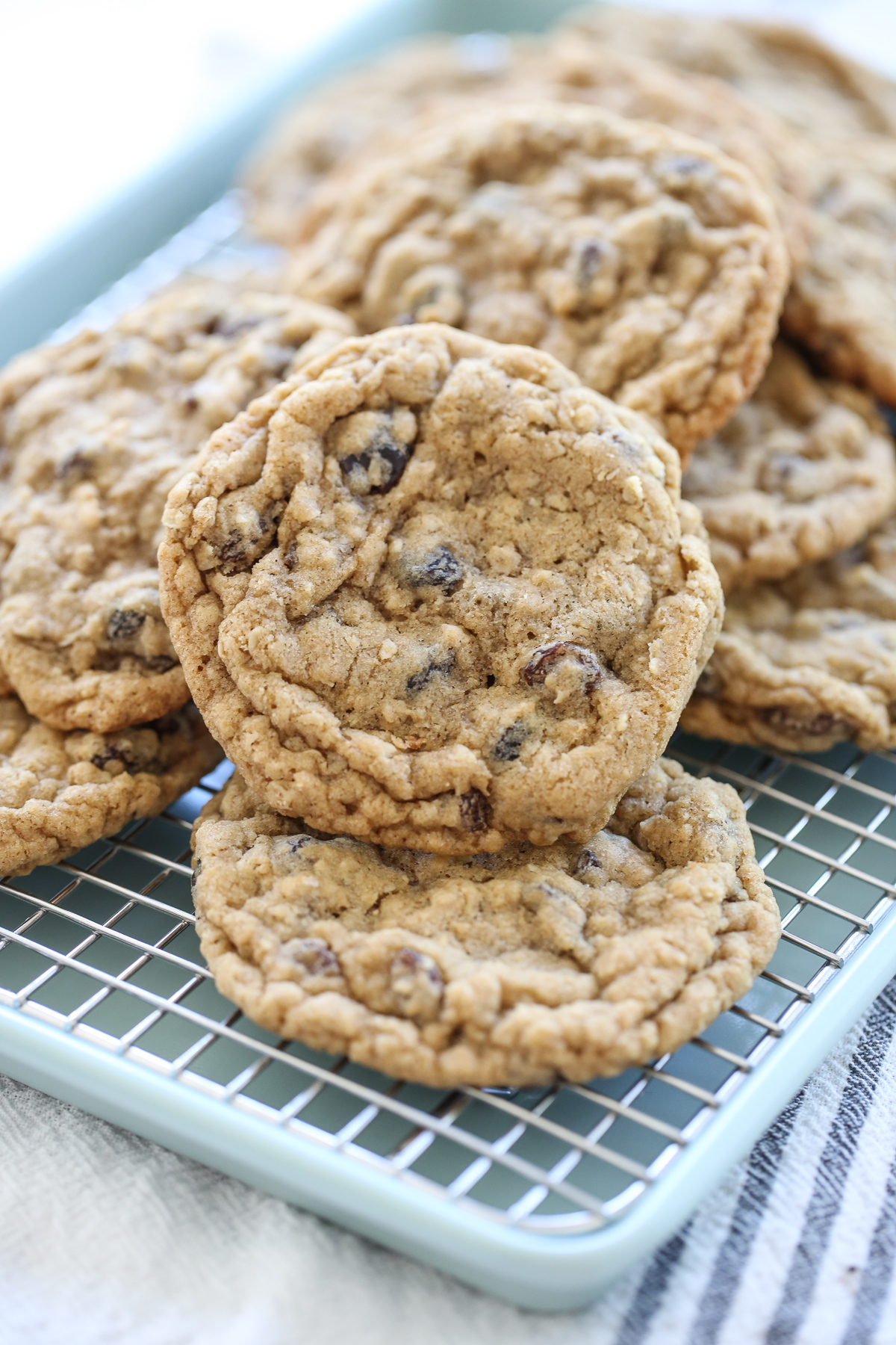 stack of oatmeal raisin cookies on a cooling rack