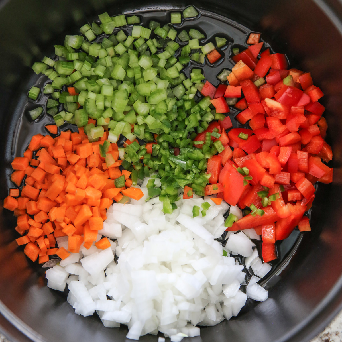 chopped veggies in a stock pot
