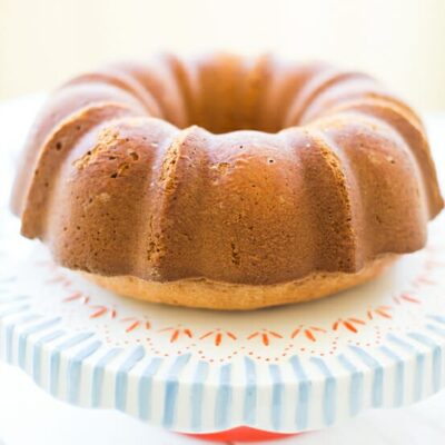 A lemon-lime soda Bundt cake on a cute cake stand.