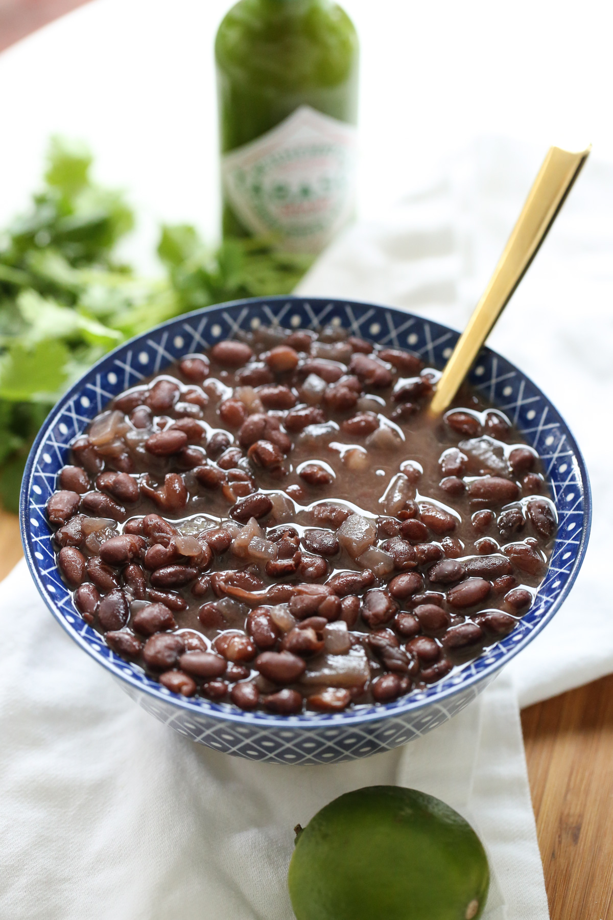 cooked black beans in a blue bowl