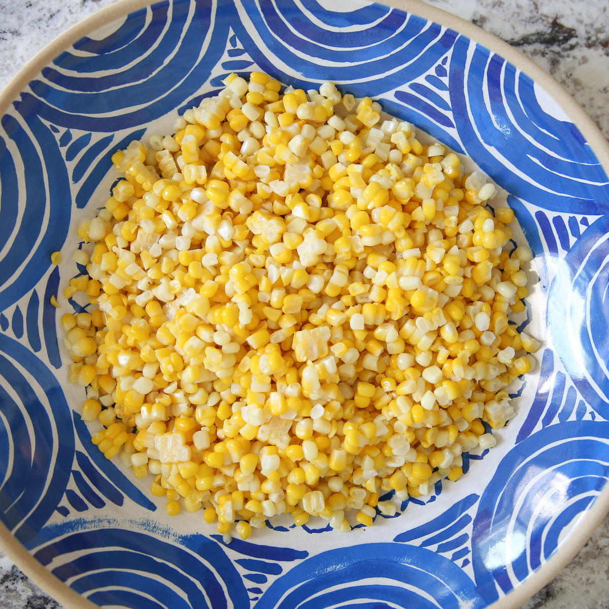 fresh corn in a blue bow