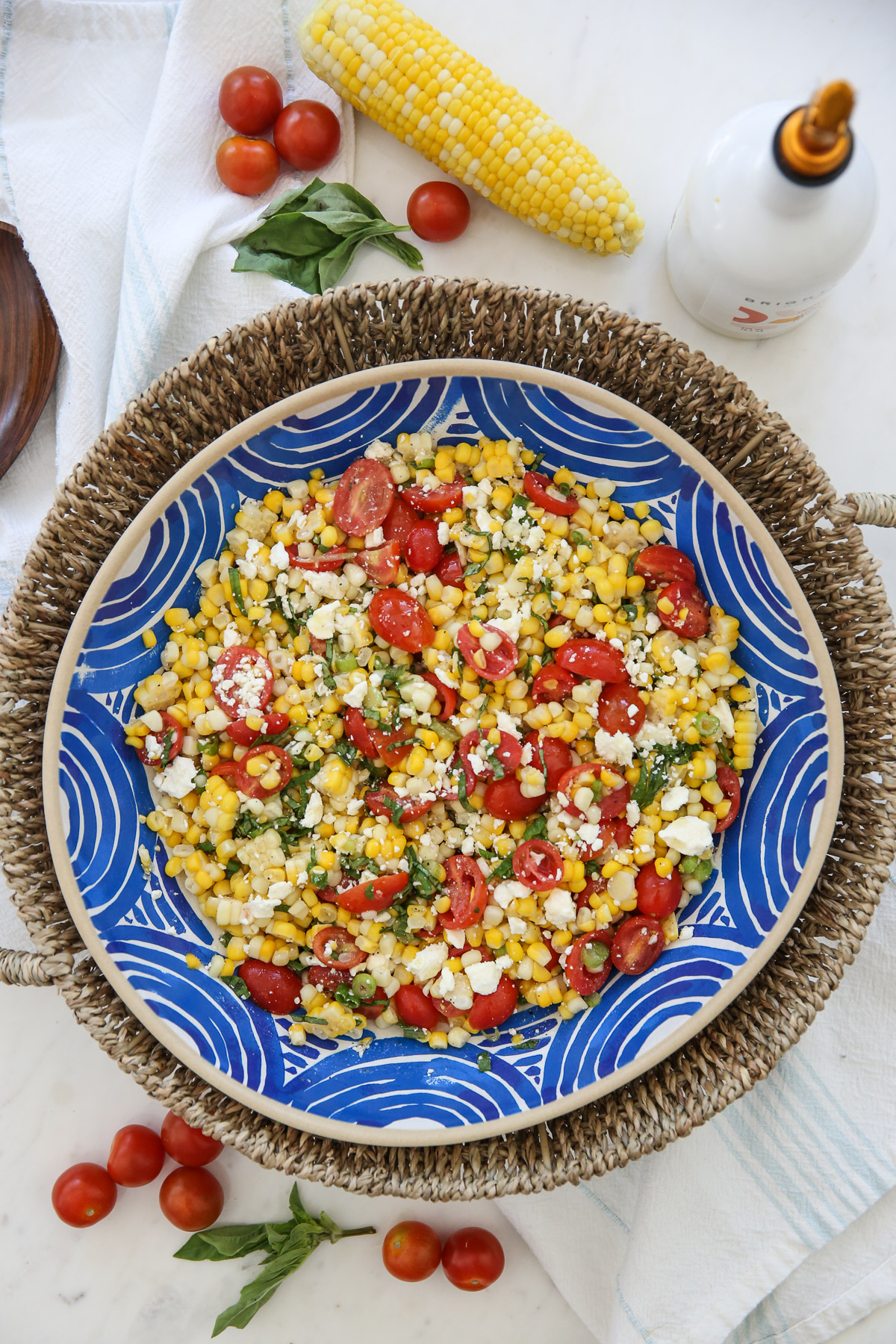 Fresh corn salad in a blue bowl
