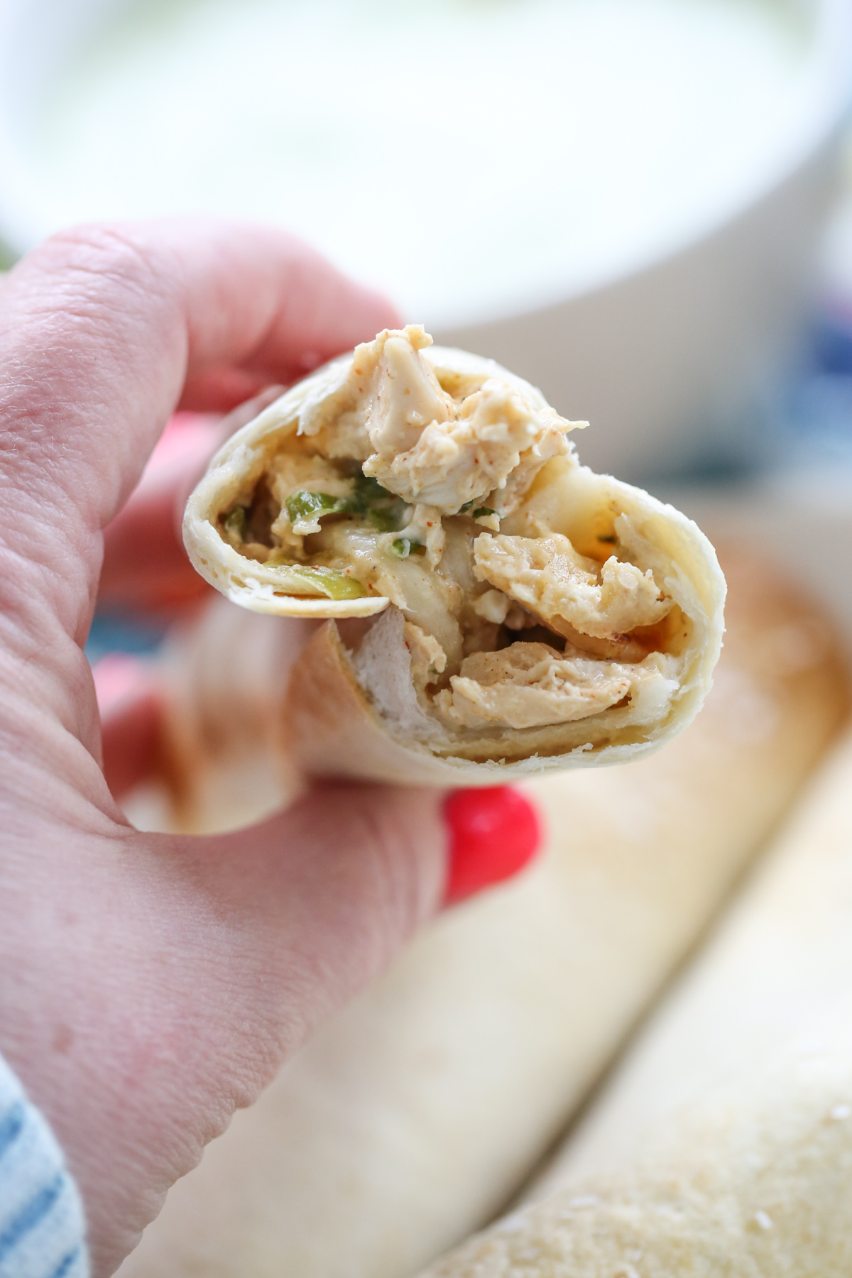 baked chicken taquito cut in half