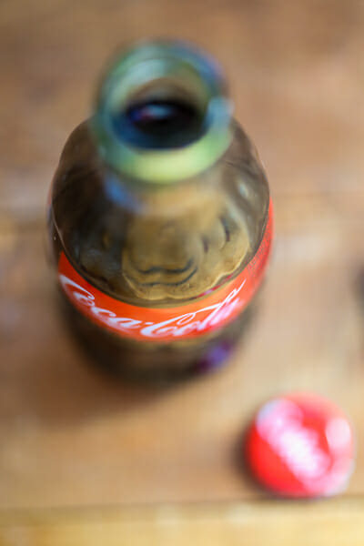 Bottle of Coke for sweet and smokey cola BBQ sauce