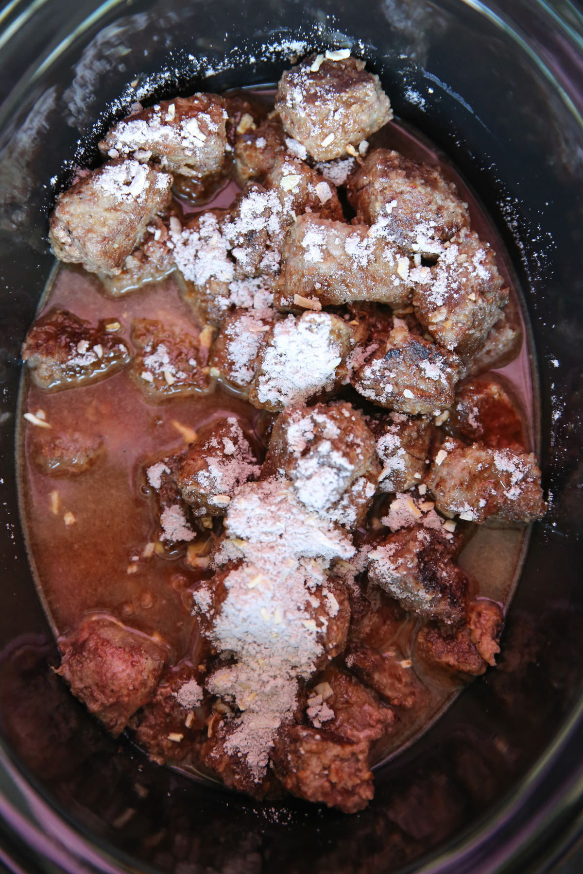 beef and onions in a slowcooker