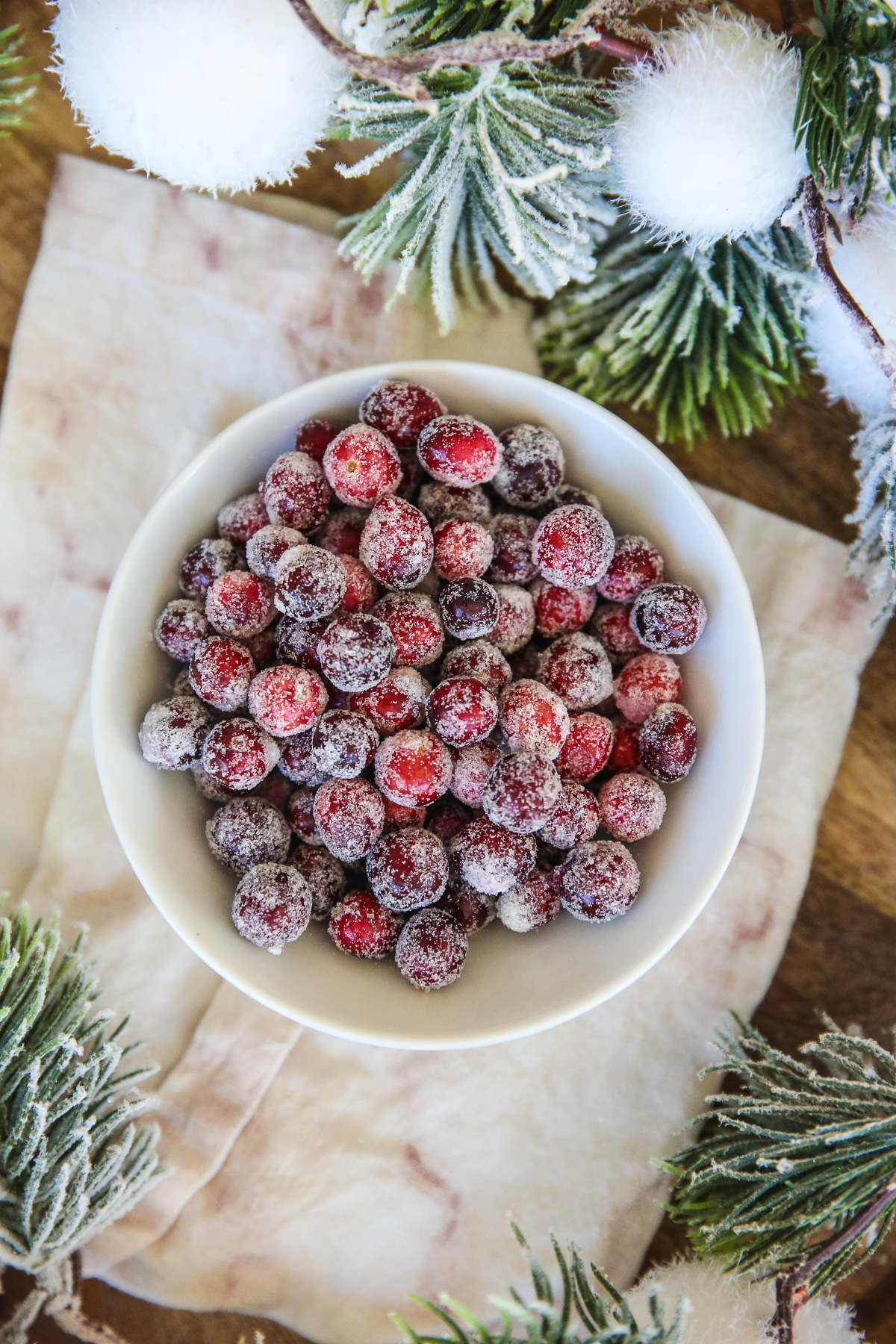 bowl of fresh cranberries covered in sugar