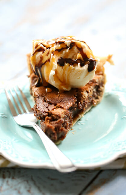 caramel chocolate pecan pie with ice cream