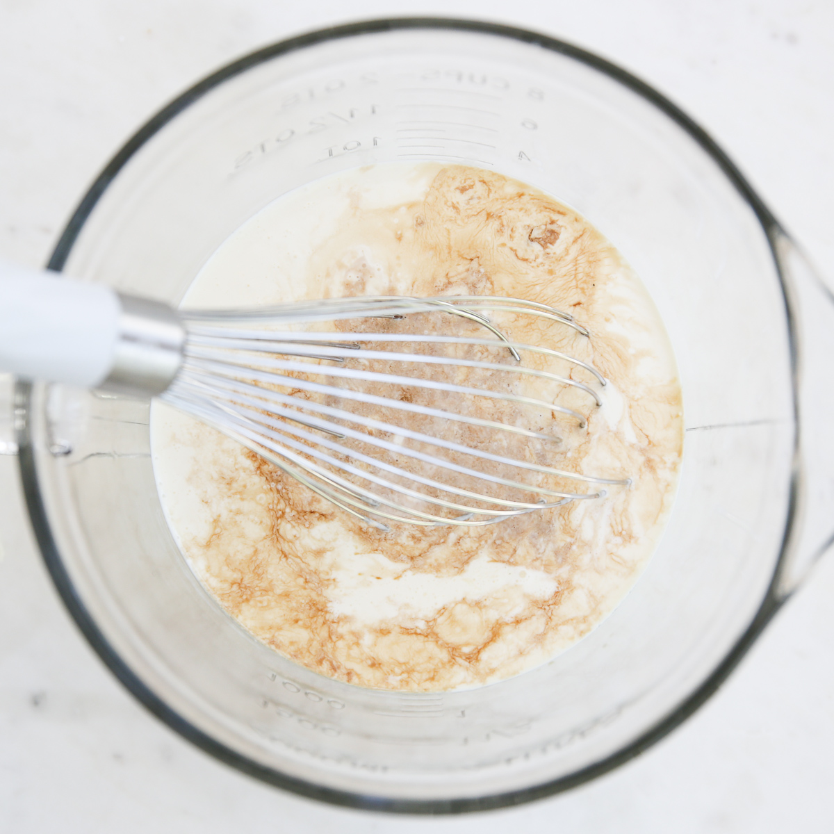 stirring ingredients for vanilla ice cream
