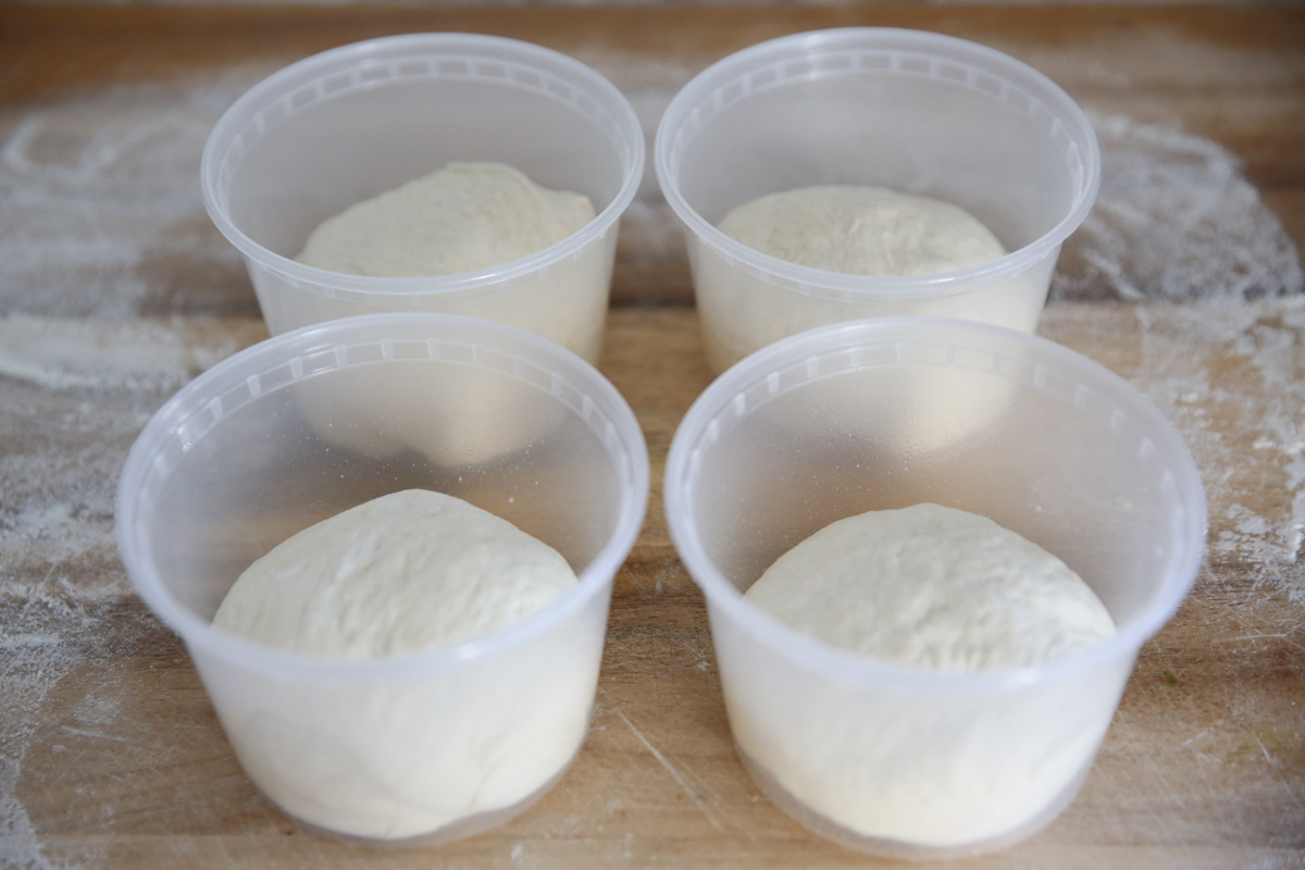 pizza dough in containers