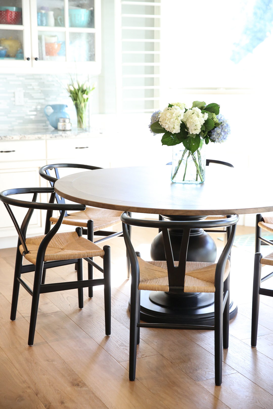 wishbone chairs and round table