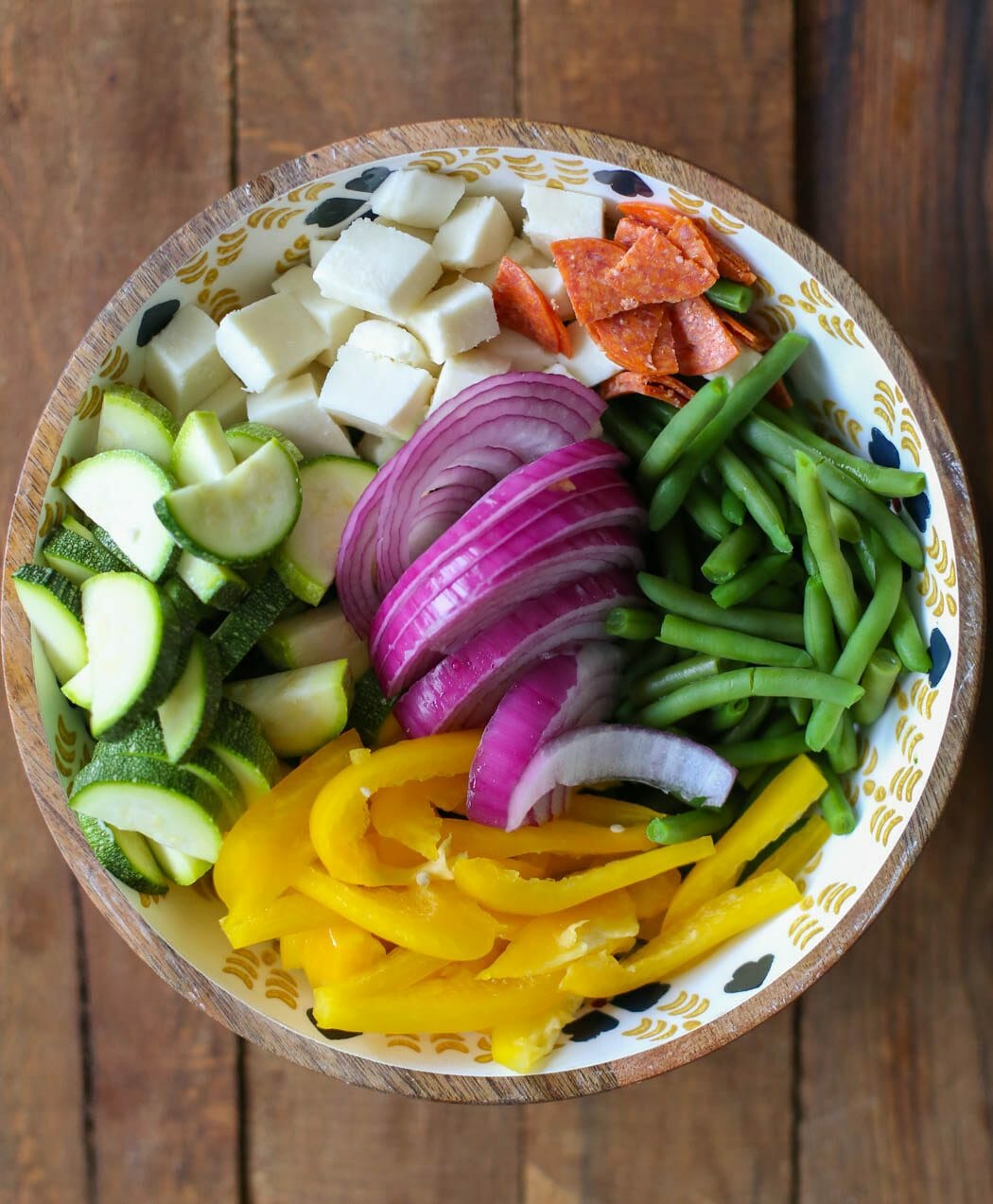 marinated green bean salad with zucchini, pepperoni, red onion, bell pepper, and mushrooms