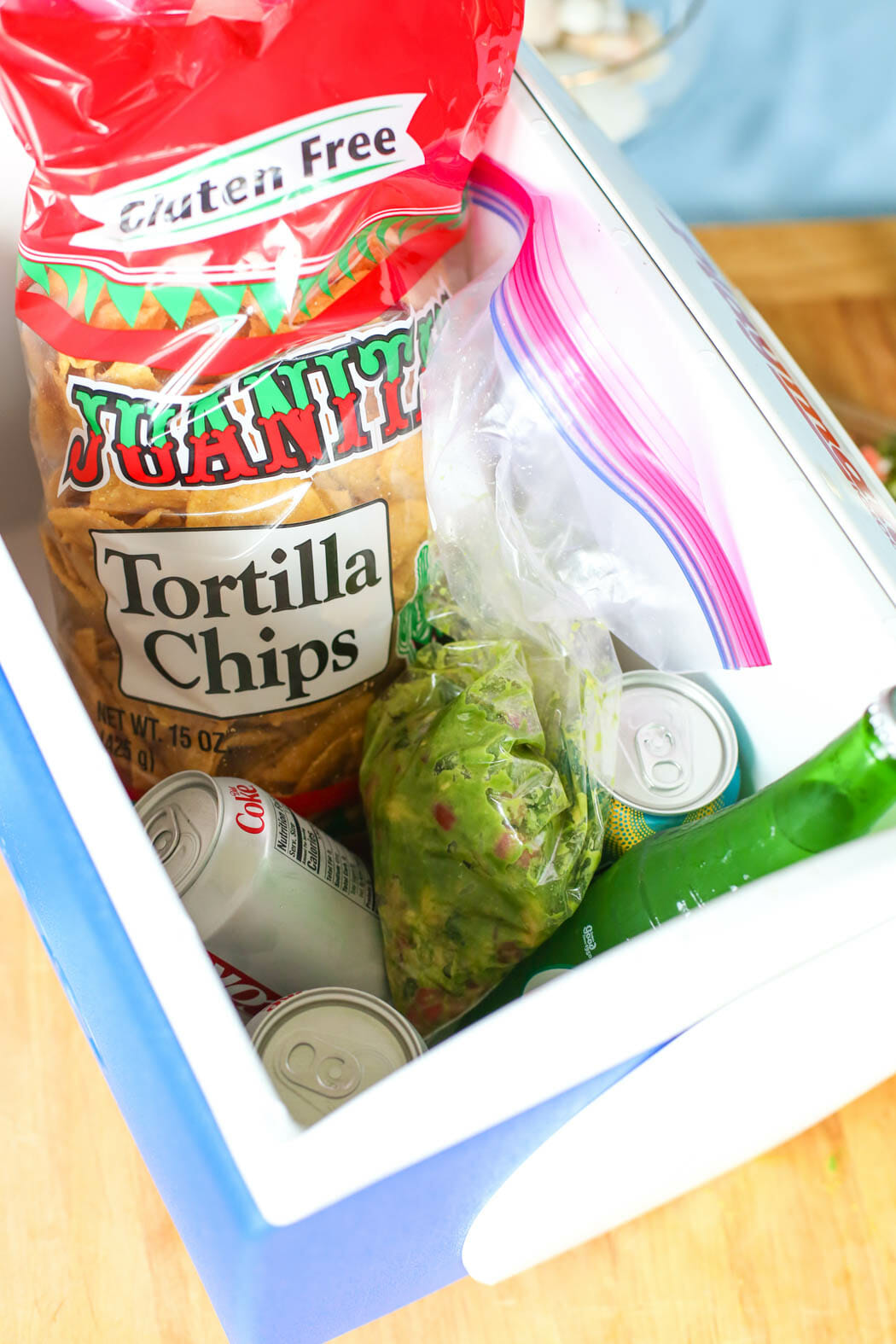 Guacamole chips drinks in cooler