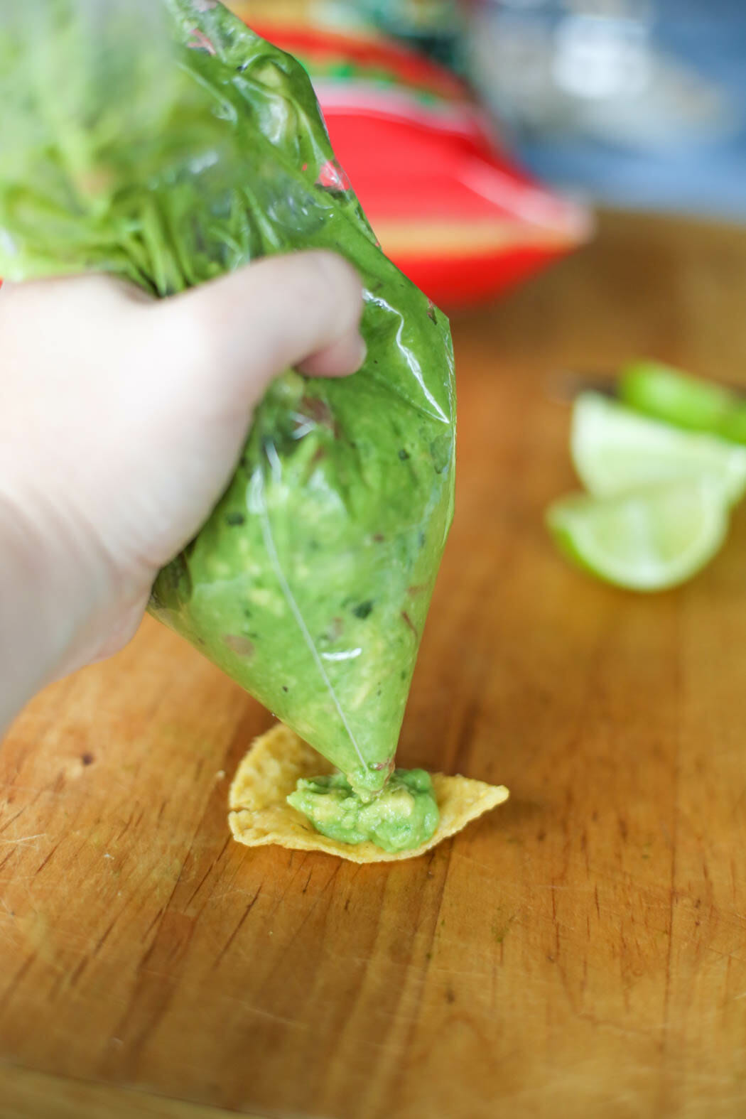 Squeezing guacamole onto chip