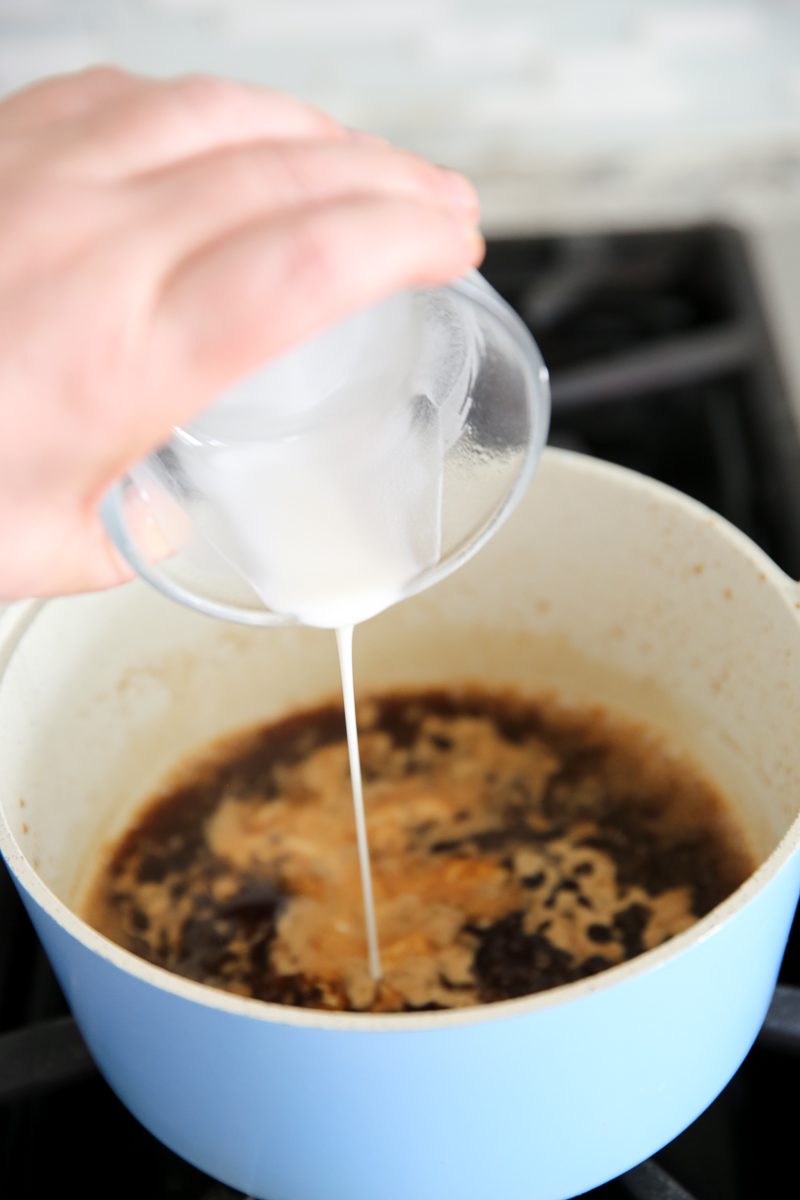 pouring cornstarch into a pot