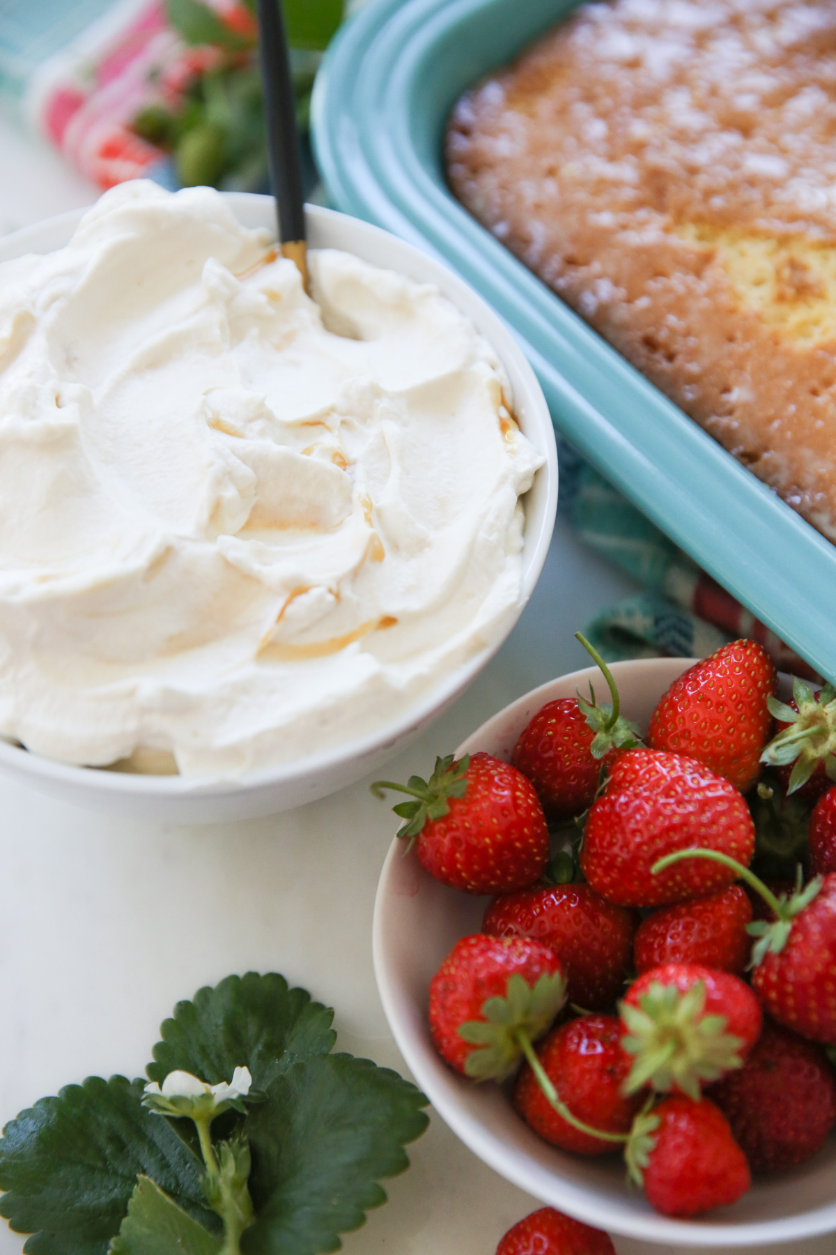 whipped cream and berries in bowls