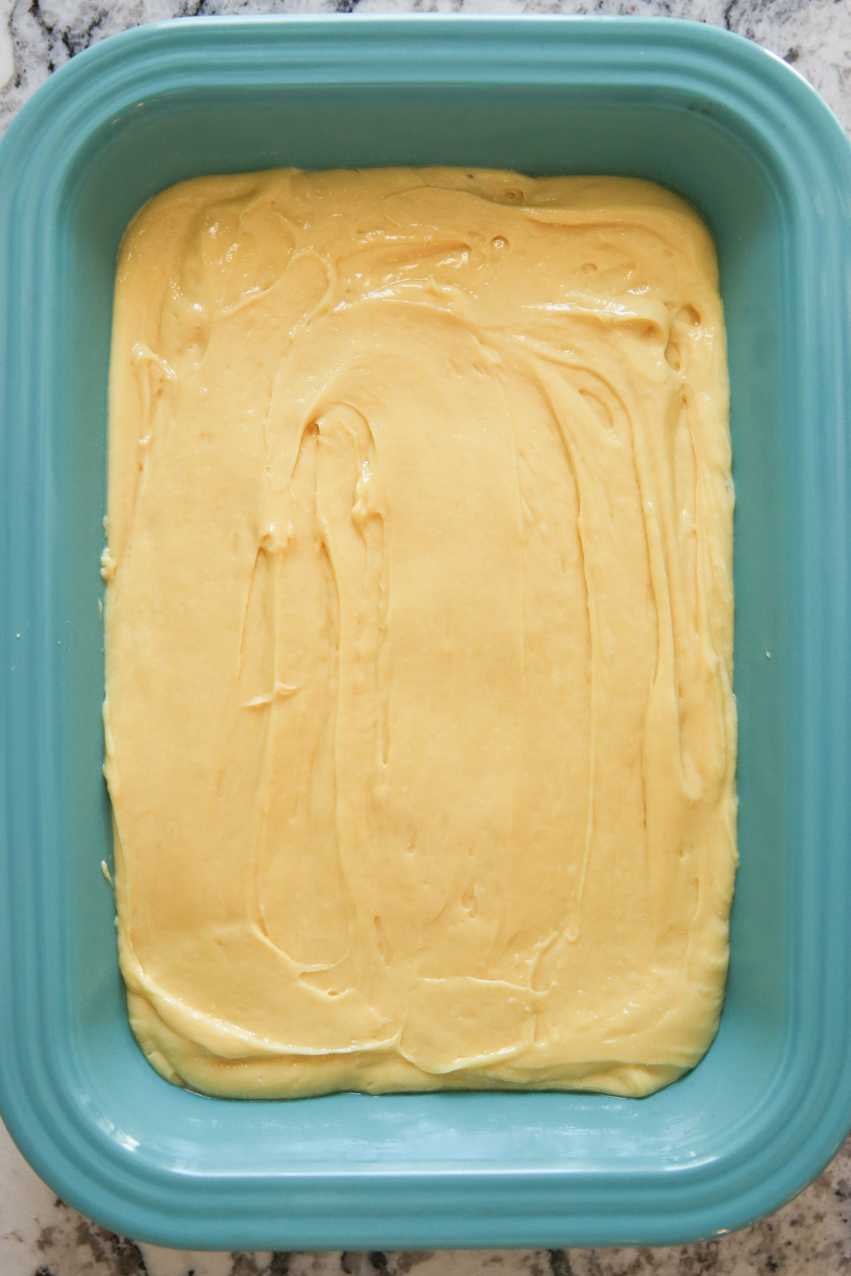 cake batter in a baking pan