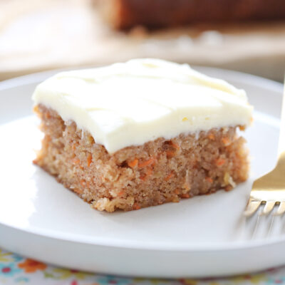 slice of carrot cake on a white plate