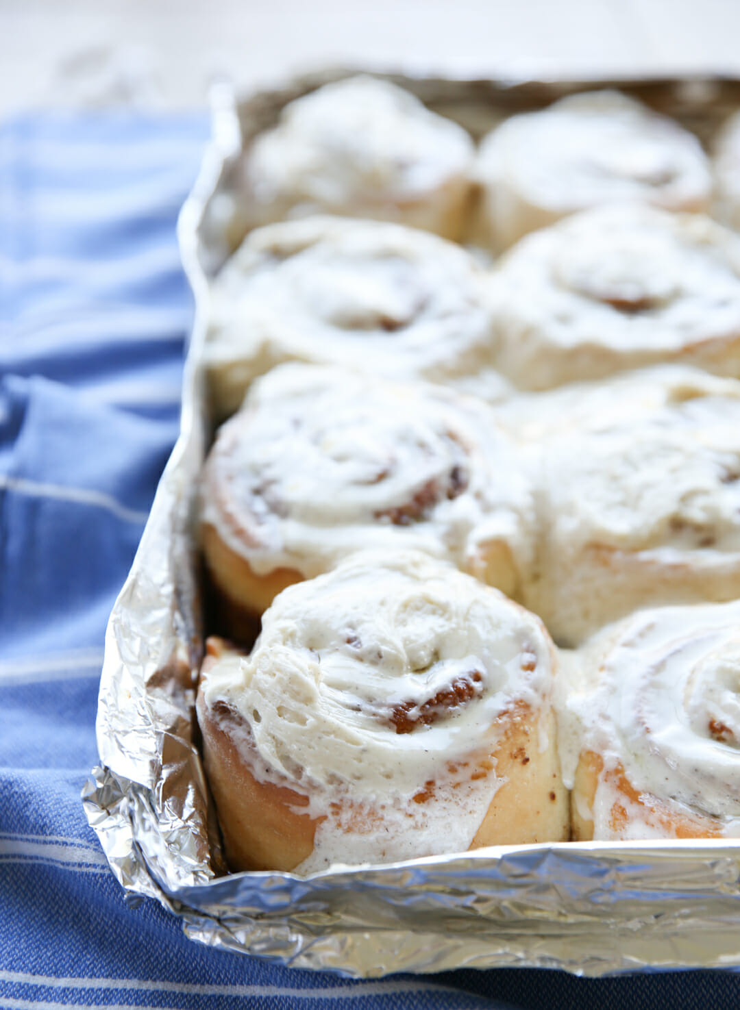 The best cinnamon Rolls with frosting in pan