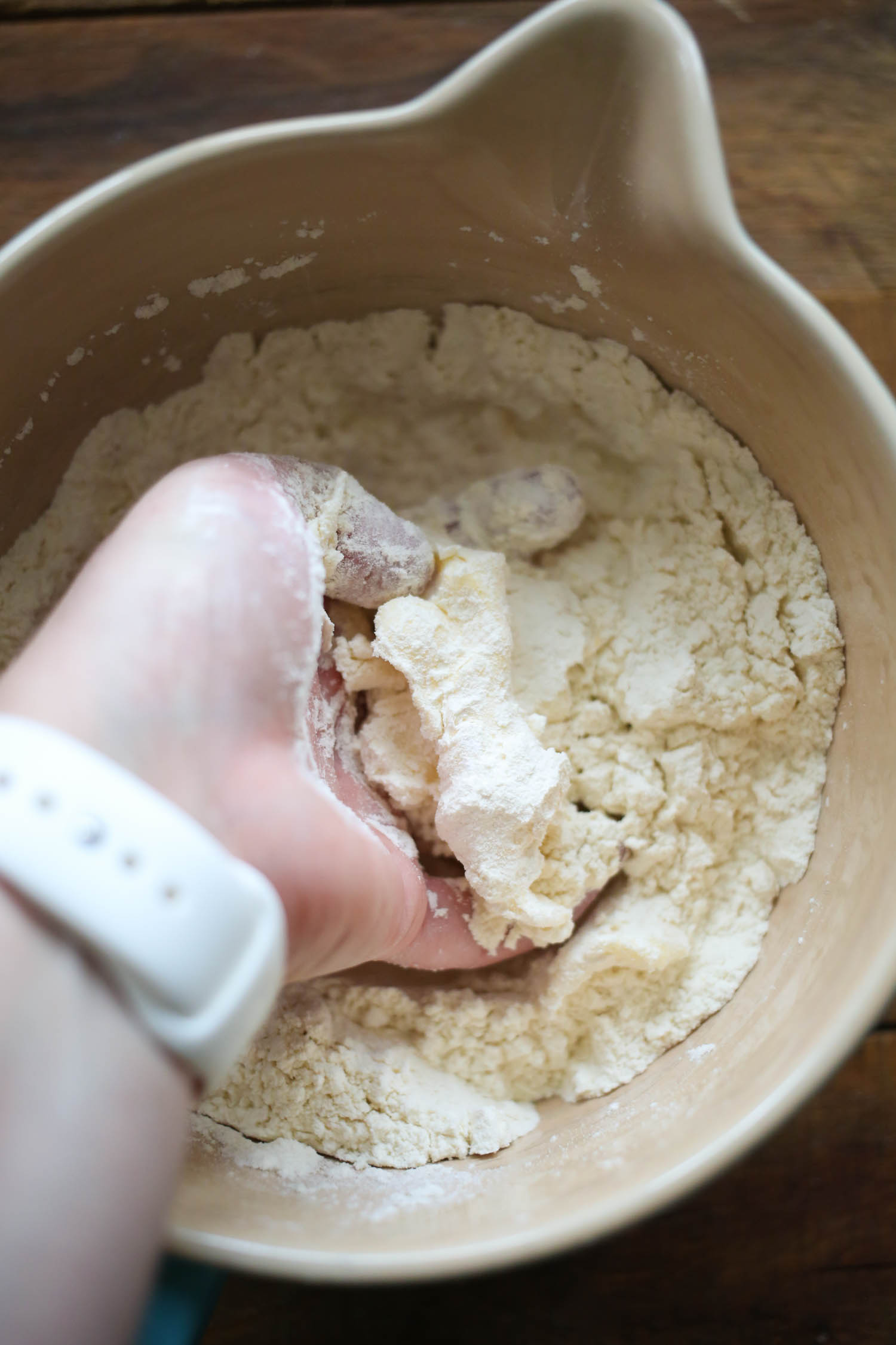 adding butter to Blueberry Grunt from Our Best Bites