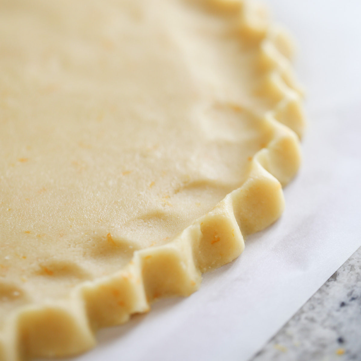 crimped edge of dough