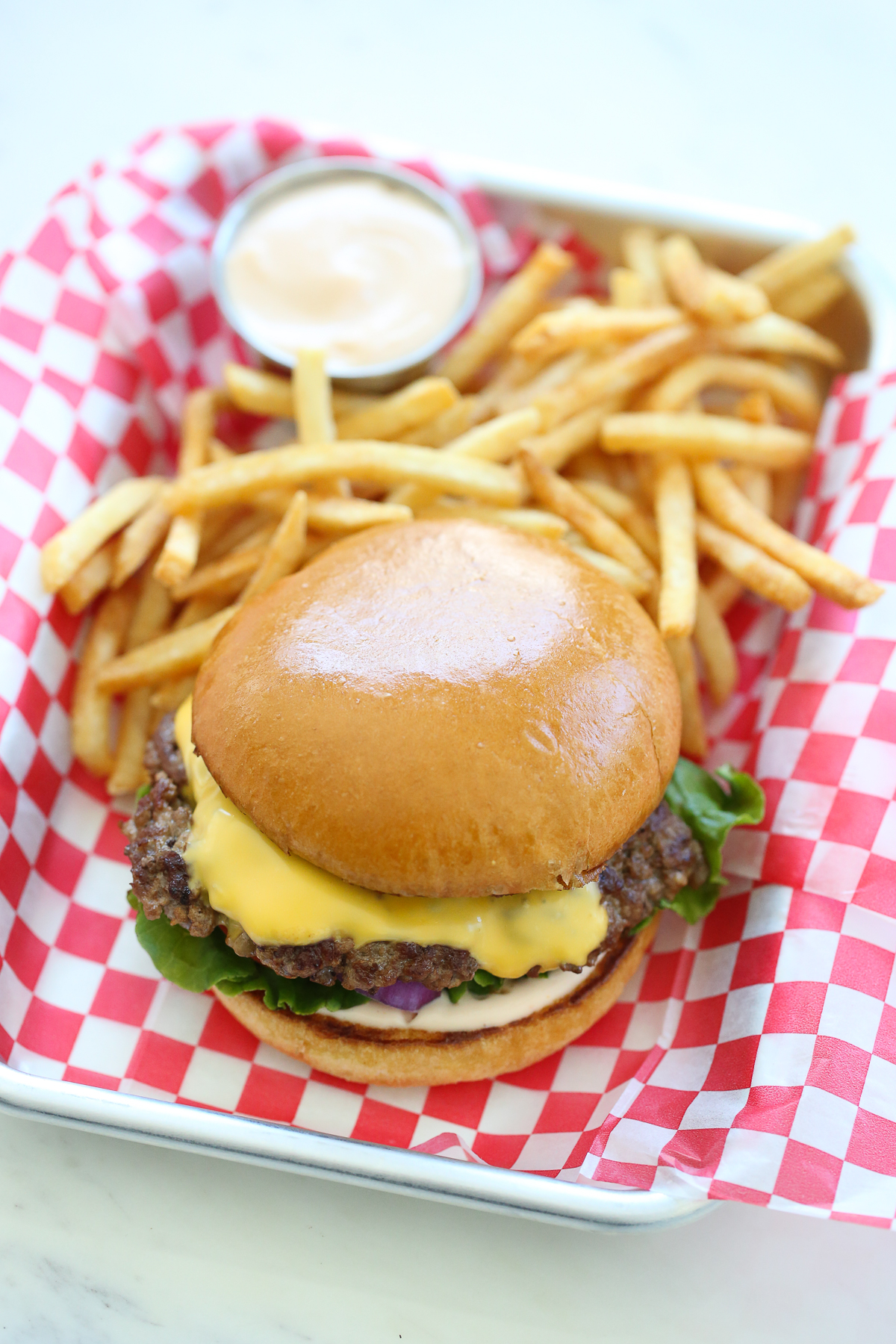 Smash Burger in a basket with fries