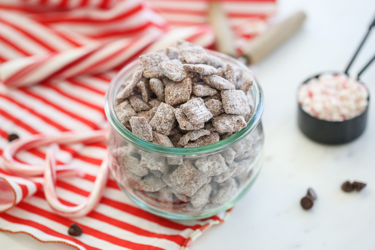 Candy Cane muddy buddies in a glass jar