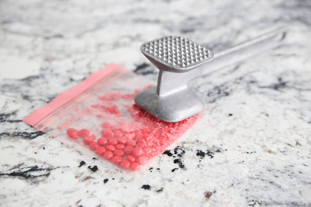 Crushing red hots with a hammer