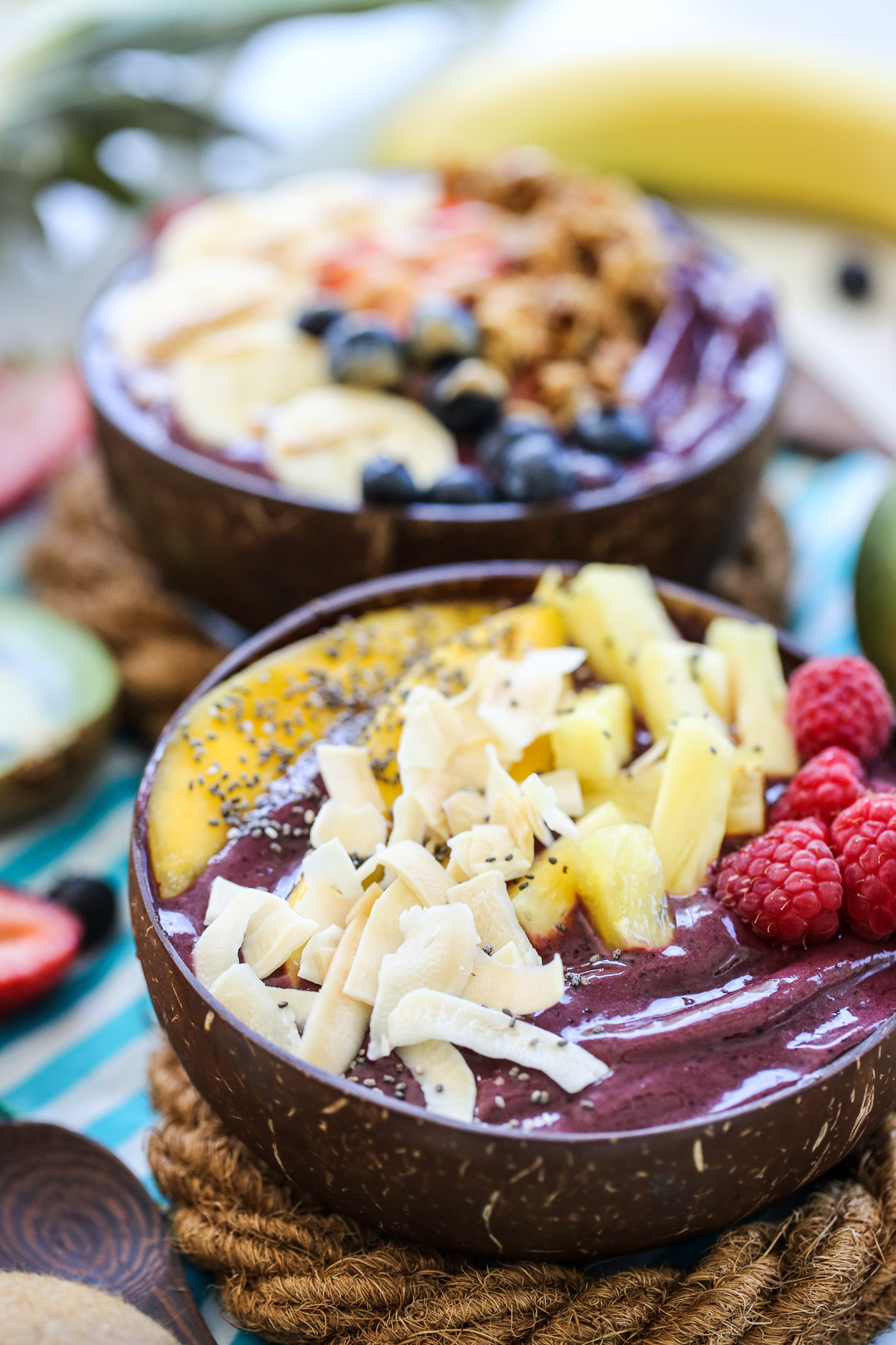 acai bowls topped with tropical fruit