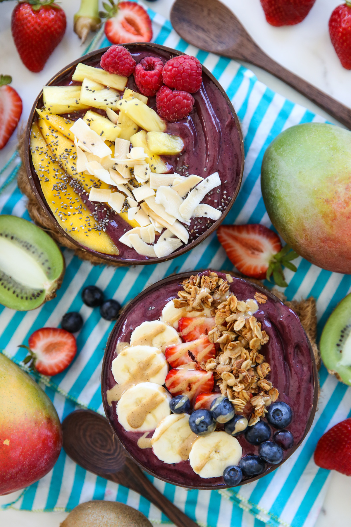 acai bowls topped with tropical fruit