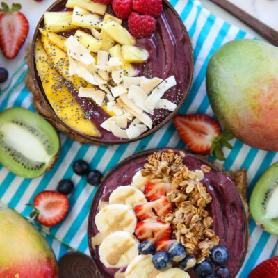 acai bowls topped with tropical fruit