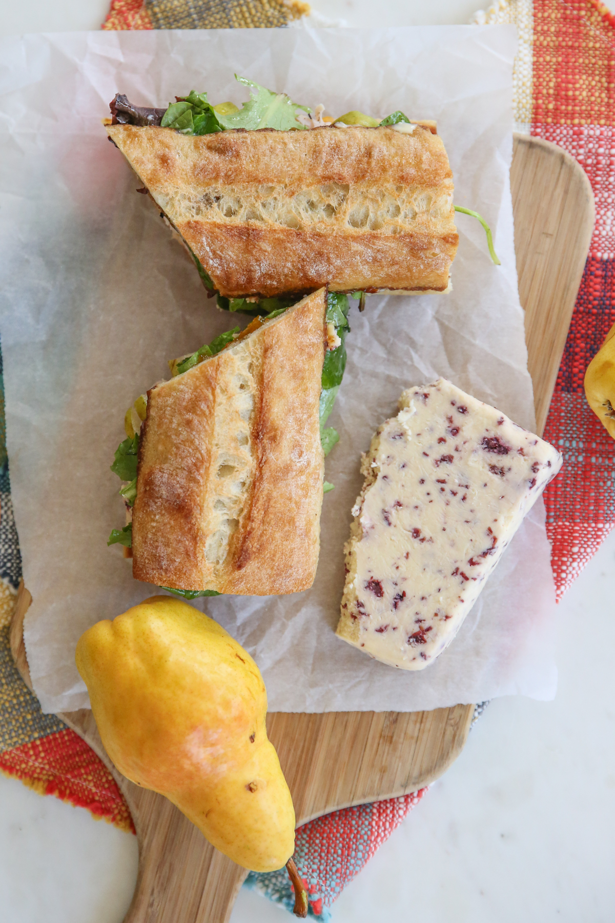 Turkey and Pear Sandwich on a cutting board