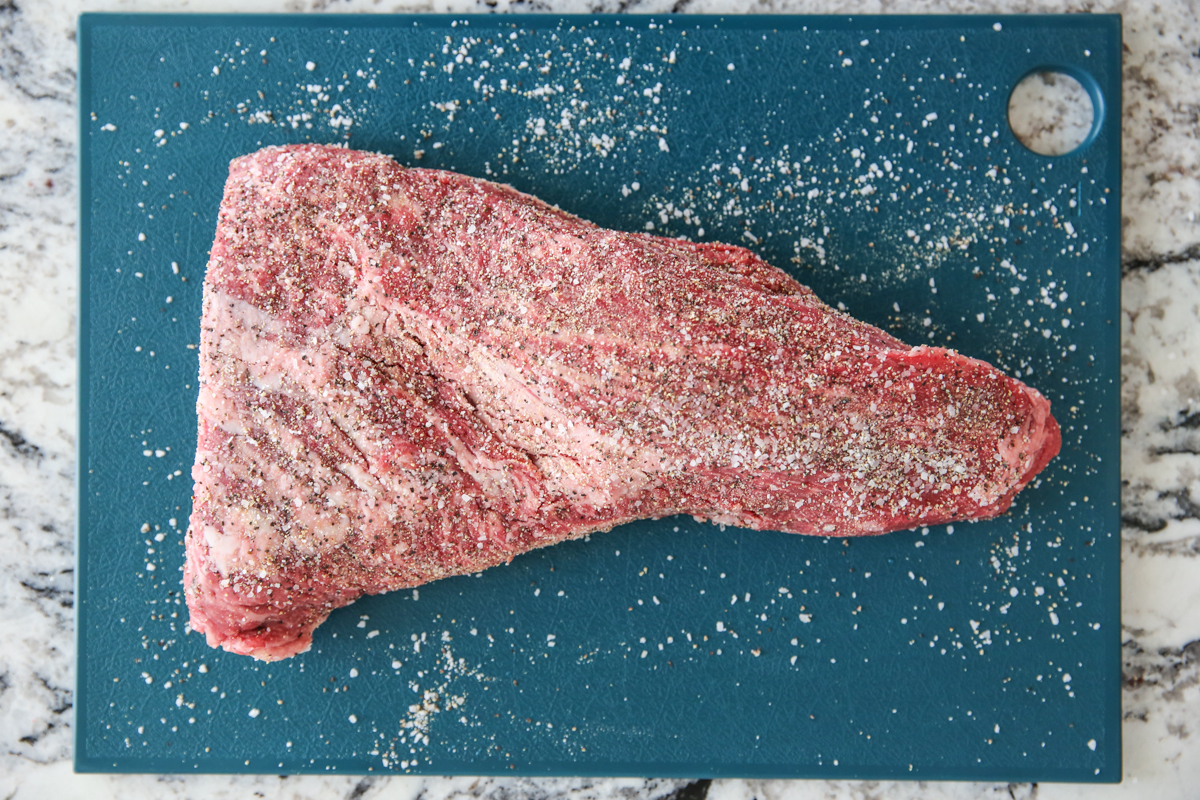 tri tip steak on a cutting board