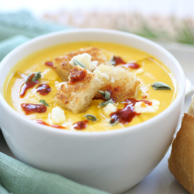 Roasted Butternut Soup in a bowl with feta and croutons