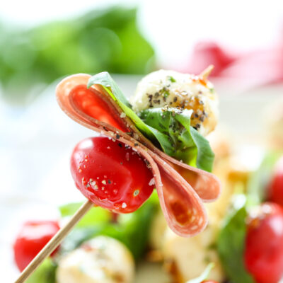 Caprese bite appetizer on a tooth pick