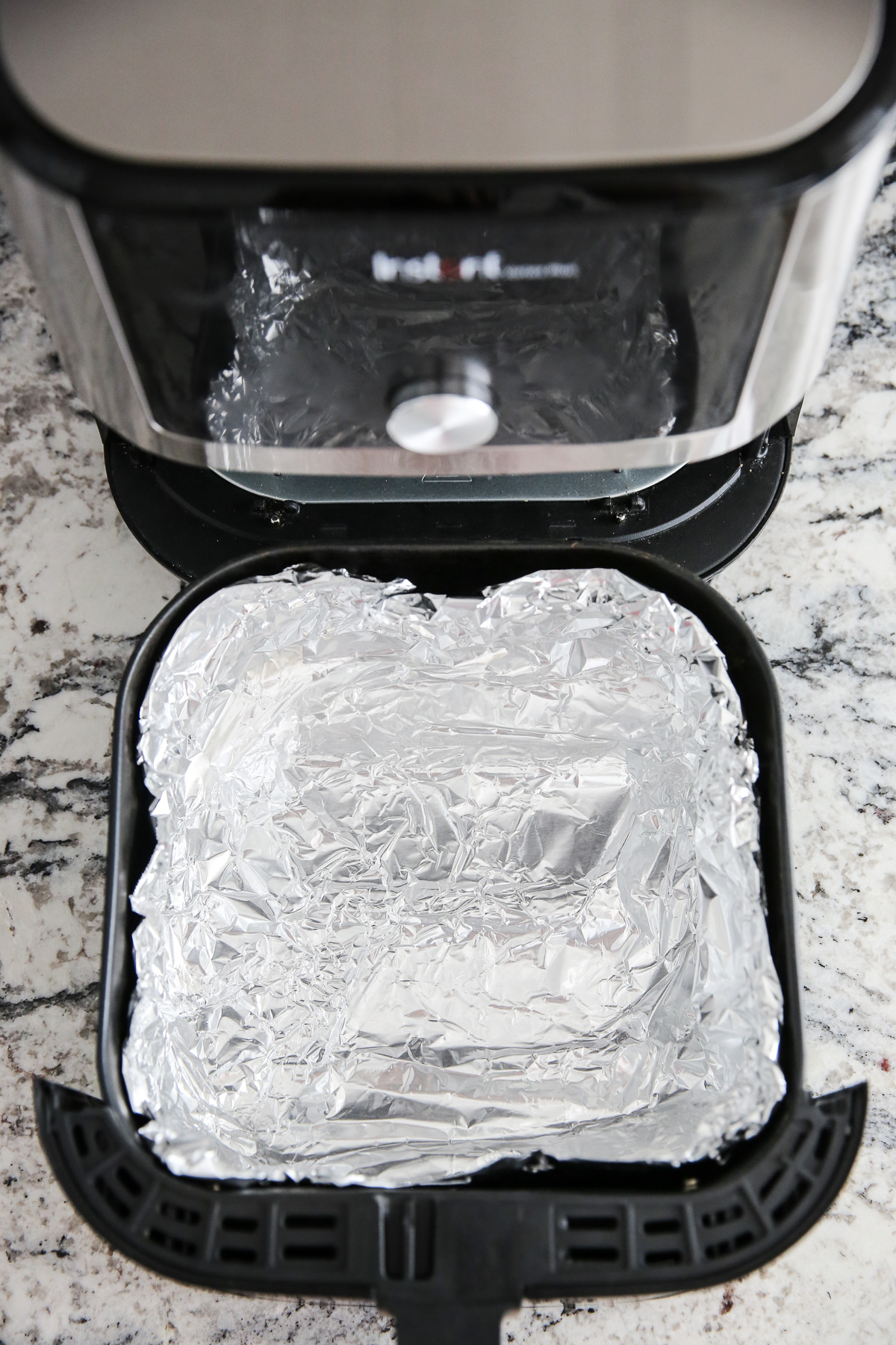 air fryer basket lined with foil