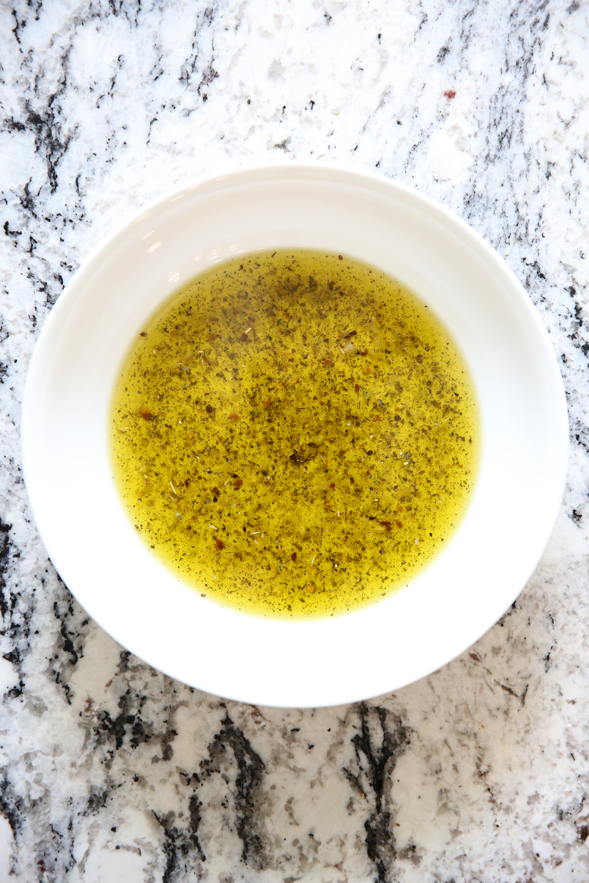 olive oil with spices mixed in