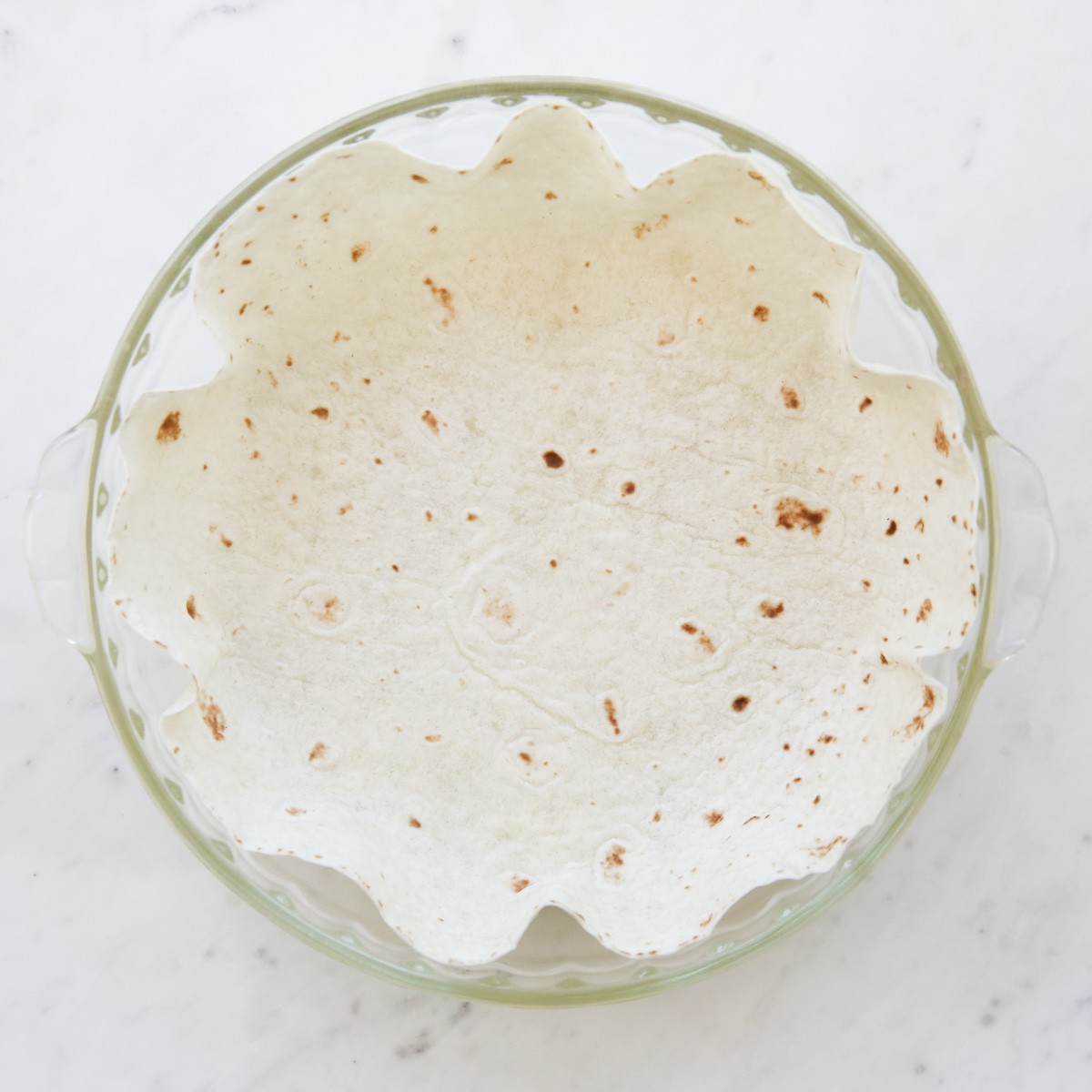 tortilla lined pie plate