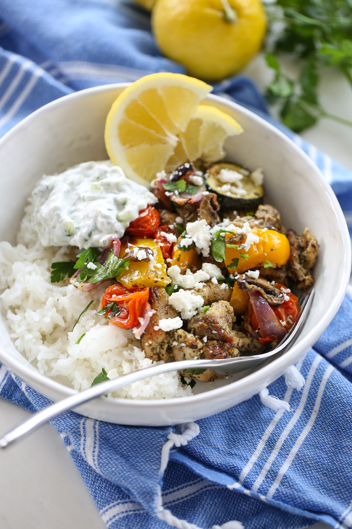Greek Sheet Pan Chicken over rice